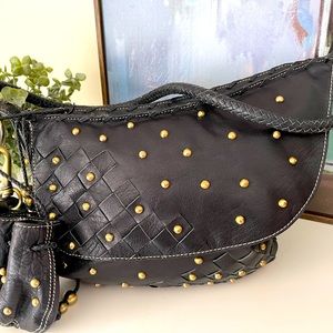 Maxx New York Maxximum bag in black leather with brass embellished and hardware